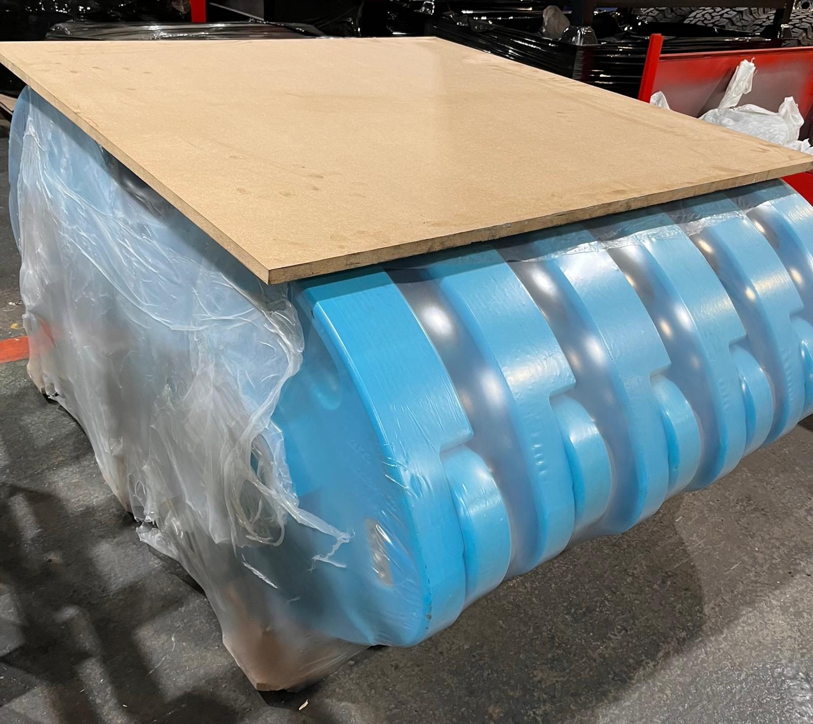 Shrink-wrapped pallet of polymer RunFlat segments ready to ship